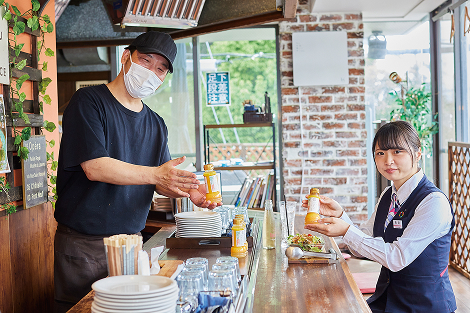 店主と尼信職員